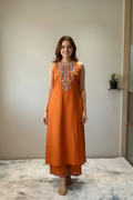 Different model in orange kurti with clean background
